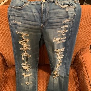 American Eagle ripped blue jeans
